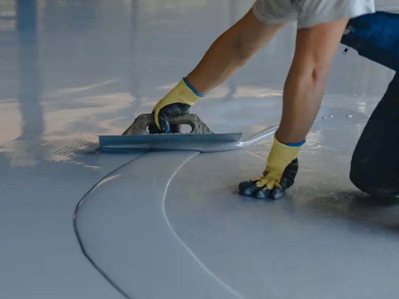 Professional epoxy flooring installation in Dubai - garage floor coating